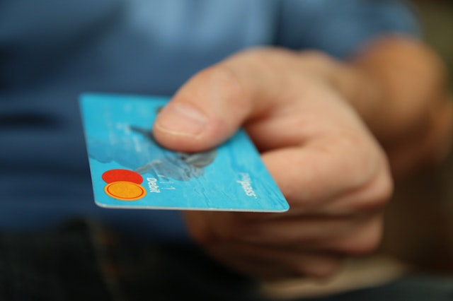 Handing Over Credit Card