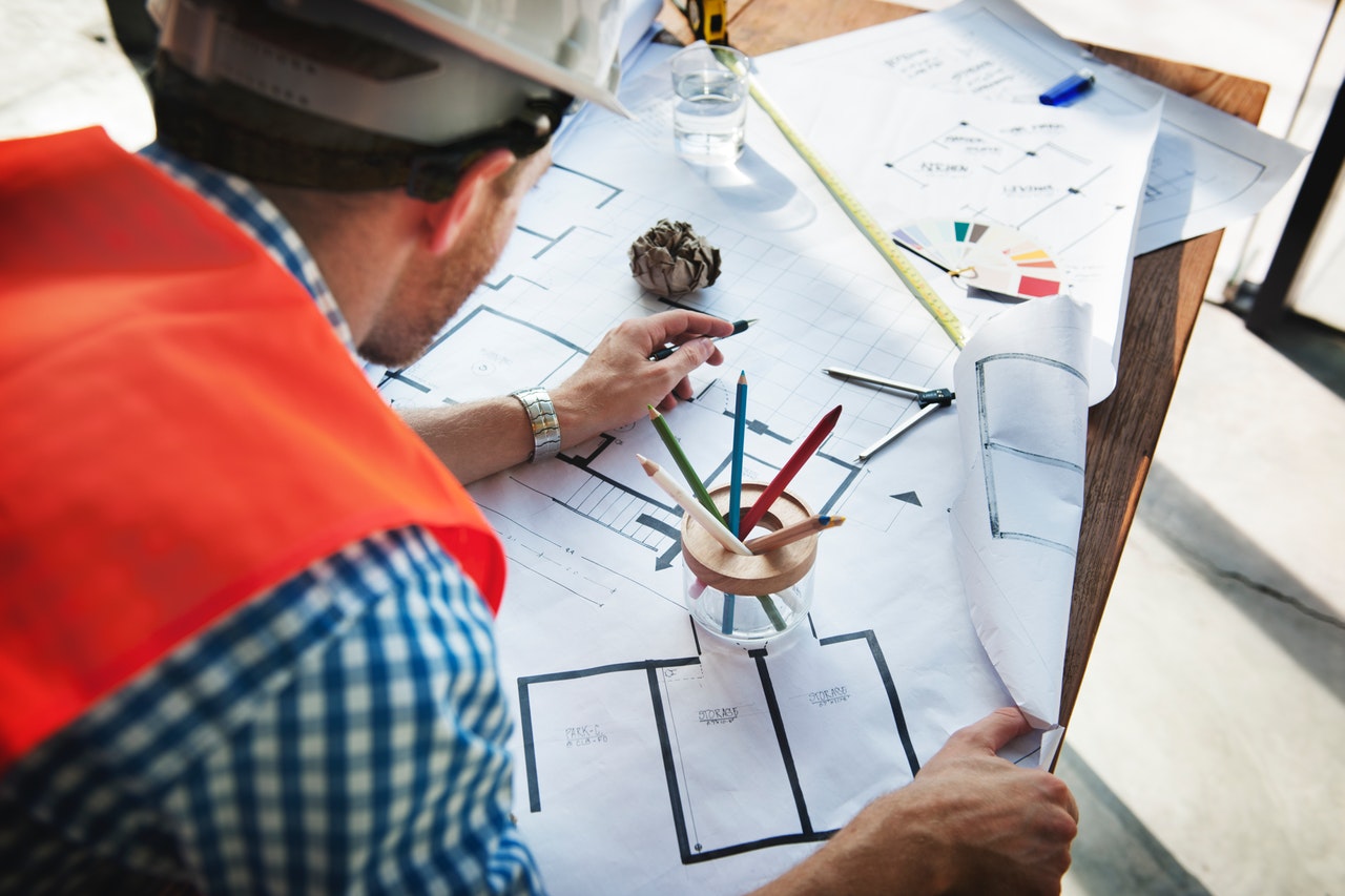 Architect Looking Over Plans