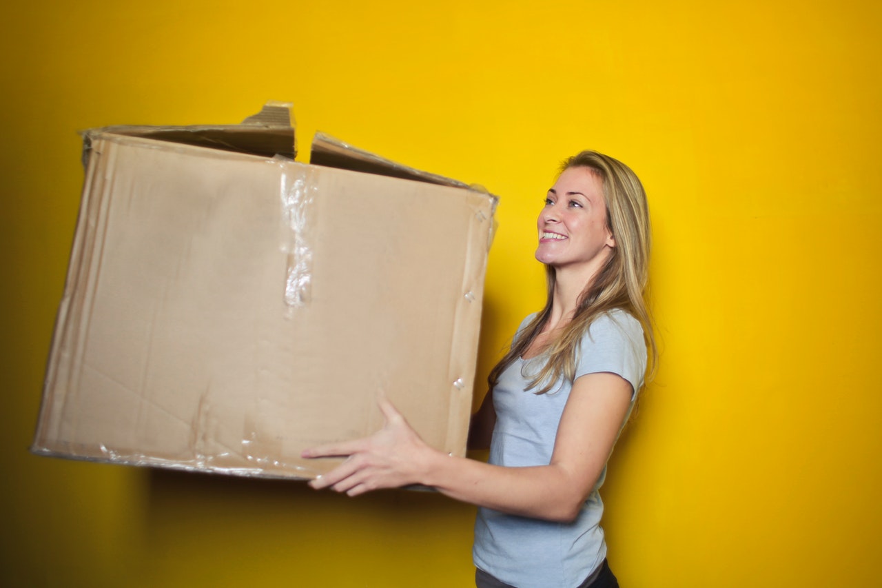 Woman with Big Cardboard Box