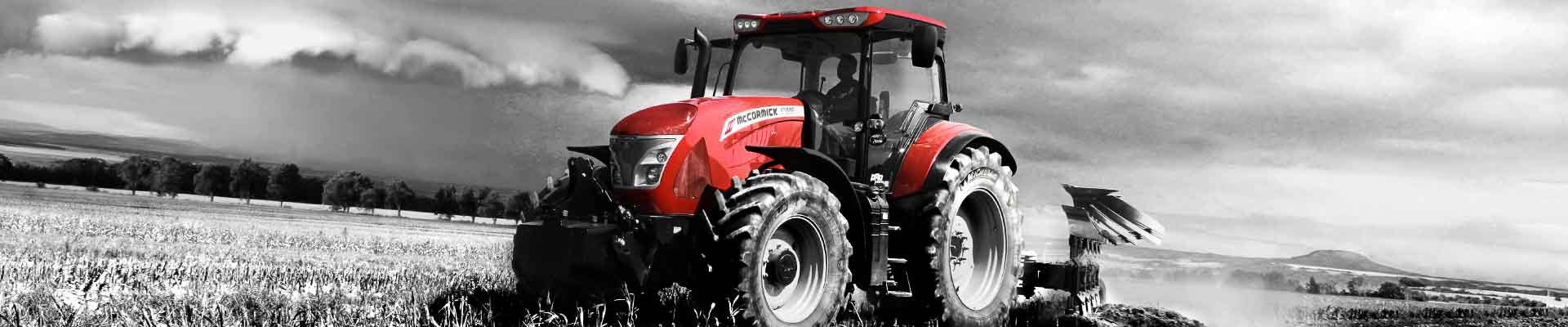 Red Tractor on Black and White Background